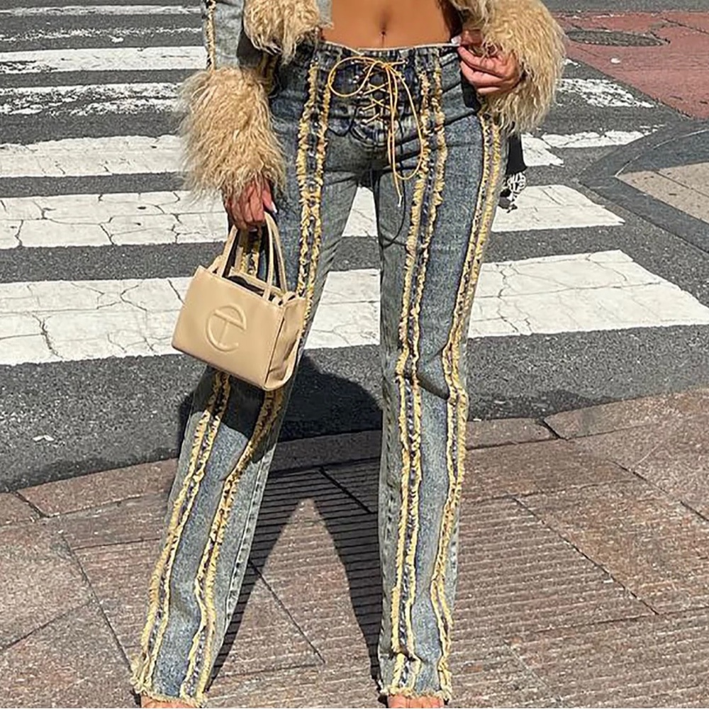 Brand new  medium wash laced up jeans